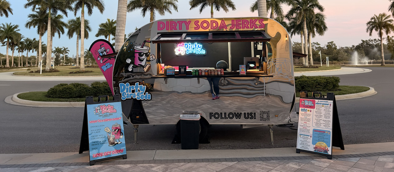 Dirty Sara-Soda wrapped trailer